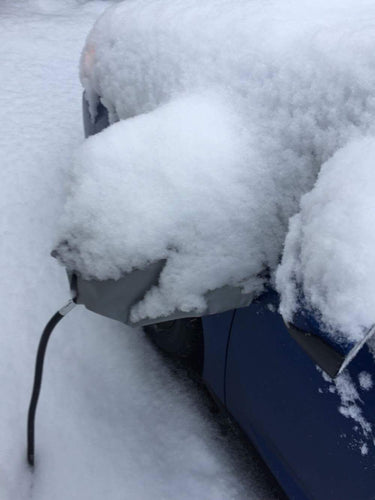 EV Plug Protector covered in snow